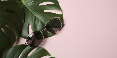 Tropical leaves monstera with sunglasses on pink background. Empty space flat lay. Creative minimal summer concept. Generative AI photo