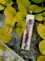 handmade resin jewelry, pressed flowers - heath in epoxy resin photo