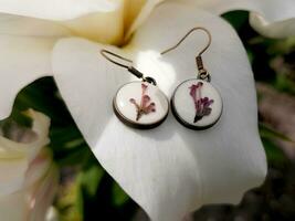 elegant handmade resin jewelry, pressed flowers in epoxy resin photo