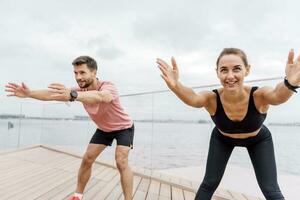 Runners are getting ready for the race. Friends are fitness people who train together. Using smart watches for fitness, sportswear photo