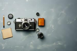 Top view of vintage camera notebook and stationery on grey background AI Generated photo