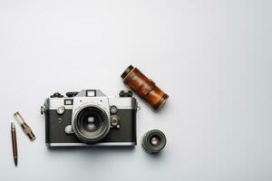 Top view of vintage camera notebook and stationery on grey background AI Generated photo