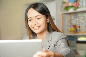 Businesswoman happy to start work in the morning photo