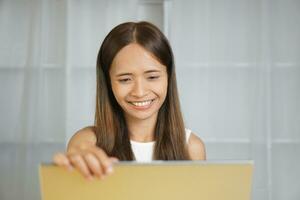 Business woman working happily at home photo