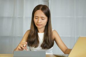 Business woman working happily at home photo