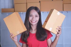 Happy online seller that sells a large number of products according to the target photo