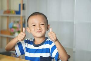 Boy sitting in the rest room at home photo