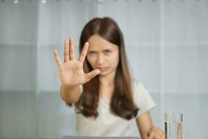 Asian woman working at home Scold the employee for making a mistake. Don't make that mistake again. photo