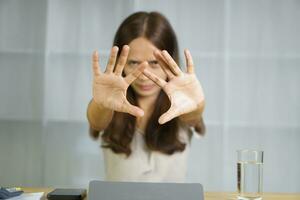 Asian woman working at home Scold the employee for making a mistake. Don't make that mistake again. photo