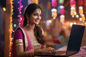 A beautiful woman in traditional clothing using a laptop on diwali, ai generative photo