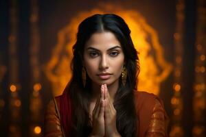 A picture of a pretty indian woman with her hands folded in prayer in front of the camera, ai generative photo