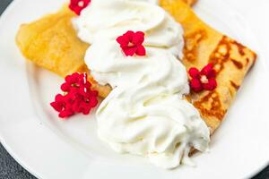 crepes whipped cream pancakes portion sweet delicious dessert appetizer meal food snack on the table copy space photo