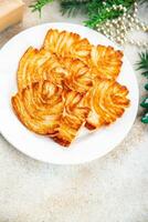 Navidad Galleta soplo Pastelería galletas dulce postre soplo niebla fiesta tratar nuevo año y Navidad comida comida bocadillo en el mesa Copiar espacio comida antecedentes rústico parte superior ver foto