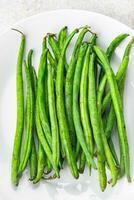 raw green beans fresh bean pod healthy eating cooking appetizer meal food snack on the table copy space food background rustic top view photo