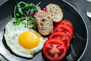 egg fried breakfast tasty fresh vegetable, toasted bread eating cooking appetizer meal food snack on the table copy space food background rustic top view photo