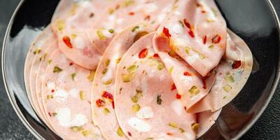 mortadella slice marinated vegetable boiled sausage olive, pickled cucumber, pepper, gherkin photo