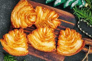 Galleta soplo Pastelería dulce galleta Navidad postre soplo niebla fiesta tratar nuevo año y Navidad celebracion comida comida bocadillo en el mesa Copiar espacio comida antecedentes rústico parte superior ver foto