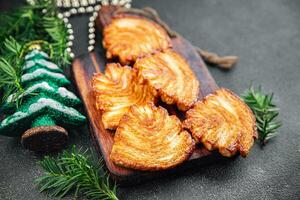 Galleta soplo Pastelería dulce galleta Navidad postre soplo niebla fiesta tratar nuevo año y Navidad celebracion comida comida bocadillo en el mesa Copiar espacio comida antecedentes rústico parte superior ver foto