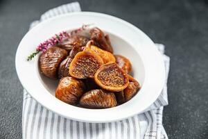 figs dried fruit smoked delicious healthy eating cooking appetizer meal food snack on the table copy space food background photo