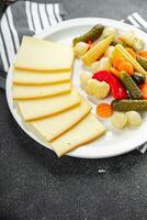 raclette cheese tasty meal vegetable eating cooking appetizer meal food snack on the table photo