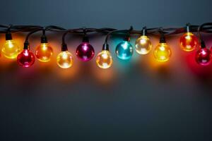 Energy efficient LED Christmas lights strand isolated on a gradient background photo