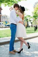Full height romantic emotional portrait of two lovers photo