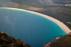 Wine glass bay as seen from Mount Amos Tasmania photo