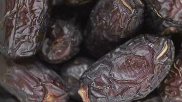 close up of fresh date fruit in a bowl on table video