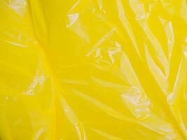 close up yellow plastic texture background photo
