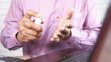 close up of young man hand using hand sanitizer spray video