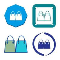 icono de vector de bolsas de compras únicas