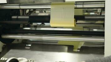 machine for cutting and packing plastic bags in the factory video