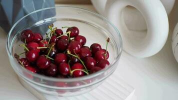 ripe fresh cherry on a white tray video