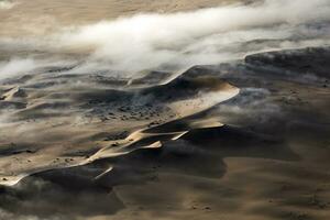 An Aerial view over the vast sand dunes that make up the great sand sea in Namibia. photo