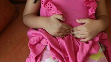 child suffering stomach pain close up. video