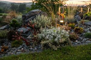 Illuminated by Outdoor Lighting System Rockery Garden photo