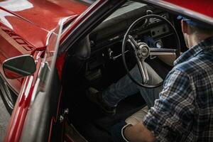 Classic Cars Mechanic Inside Restored American Muscle Car photo