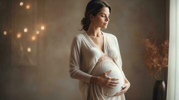 A pregnant woman is shown in the midst of a yoga pose photo