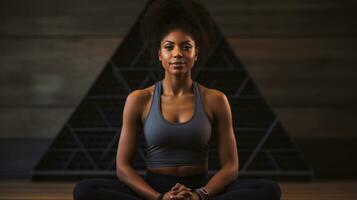 a black woman practicing yoga photo