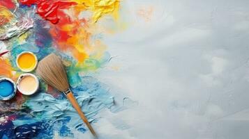 colorful paints and brushes photo