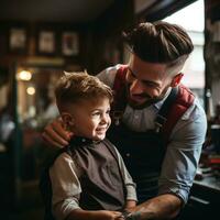 A barber trimming a boys hair with scissors photo