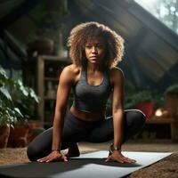 a black woman practicing yoga photo