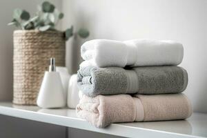 the world's softest towels against a minimalistic background. Stacked white towels sit on top of a soap dish in a bathroom. AI Generative photo