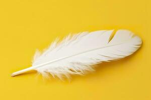 Close up of bright white feather. Copy space, yellow background. Fashion and Party concept. AI Generative photo