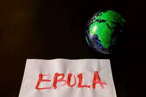 The word ebola written on paper photo