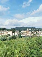 Photo of a panoramic view of a charming town nestled on a hilltop