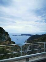 Photo of a scenic view of water from a picturesque bridge