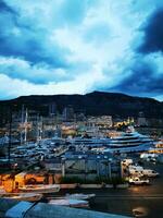 Photo of a bustling harbor under a dramatic cloudy sky