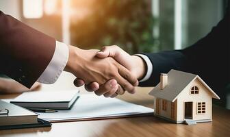 Estate agent shaking hands with a buyer after signing a contract. AI Generated photo