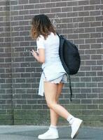 People are Walking at Main Shopping Center of Downtown City Centre of Luton City, England Great Britain UK. Image Captured on June 2nd, 2023 photo